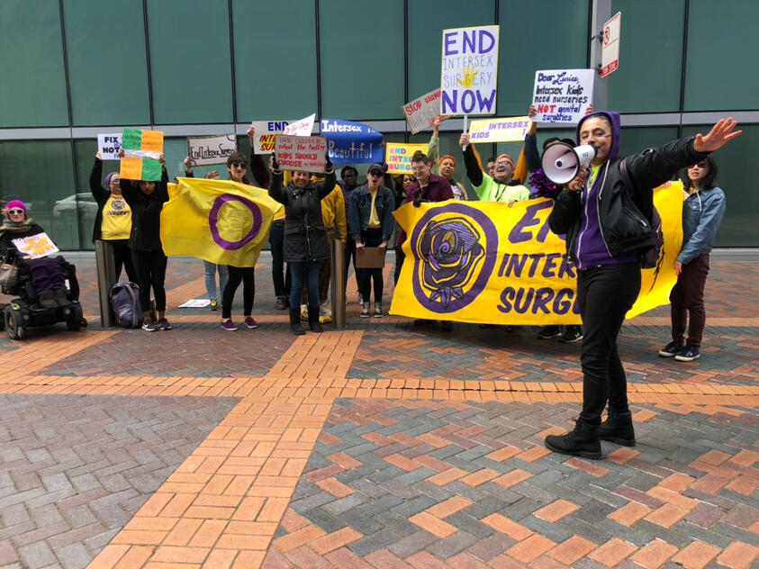 People with pro intersex rights signs